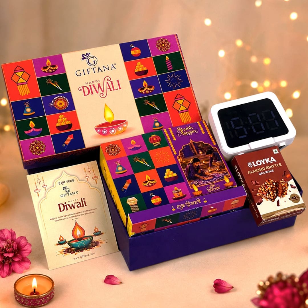 Shubh Utsav Deepavali Gift Hamper with Almond Brittle & Clock Shubh Utsav Deepavali Gift Hamper with Almond Brittle & Clock
