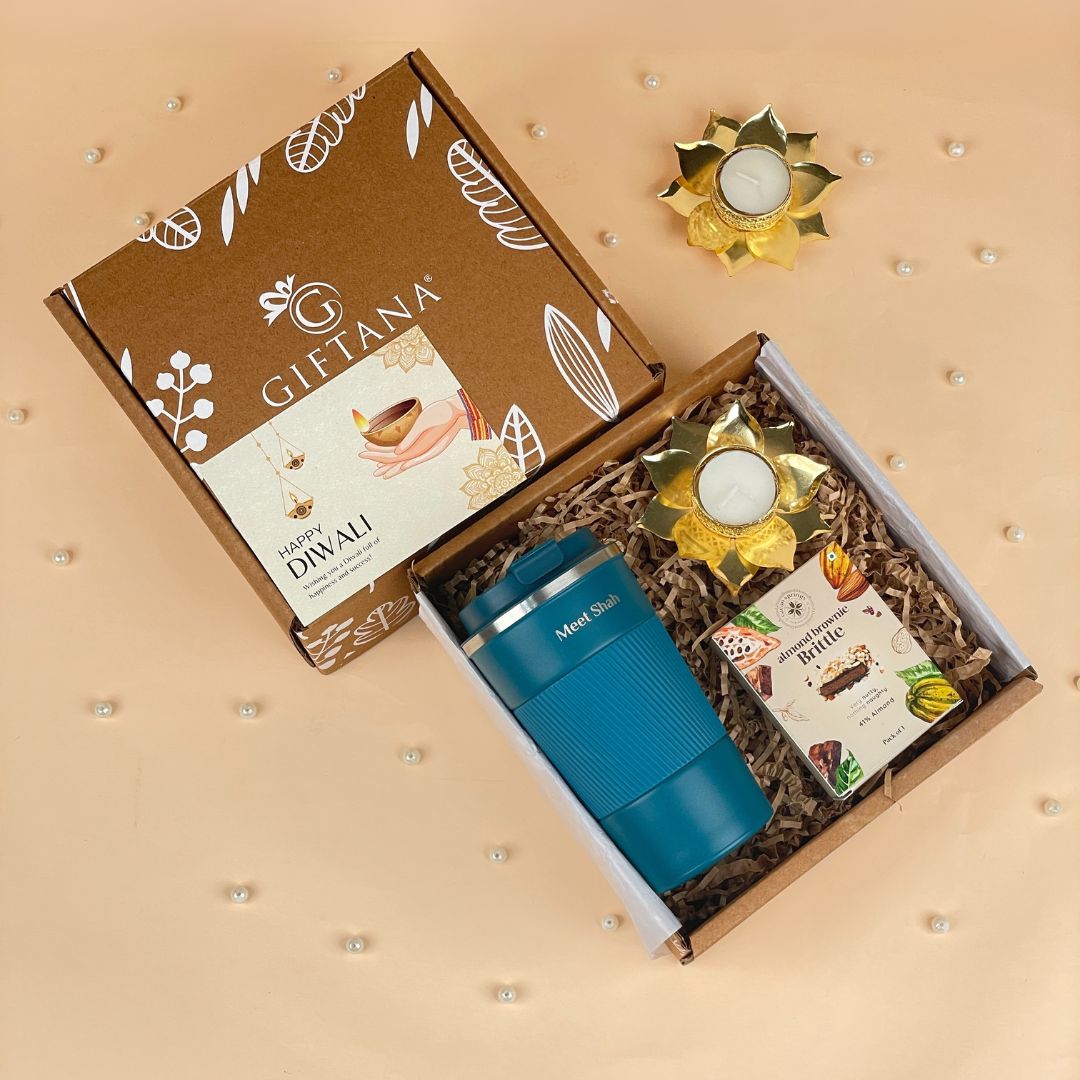 Giftana Delightful Diwali Gifts with Tumbler, Brittle, and Lotus Diya (1) Giftana Delightful Diwali Gifts with Tumbler Brittle and Lotus Diya 1